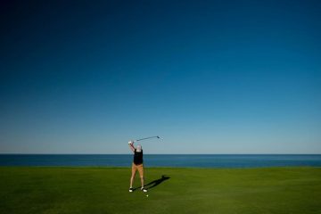 Boy playing golf