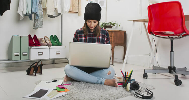 fashion blogger sitting floor