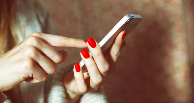 hands nails smartphone touching screen