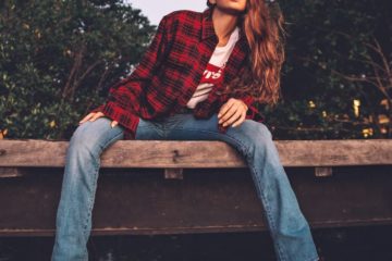 Woman Wearing Jeans and Plaid Shirt